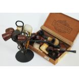 A group of 16 vintage pipes.