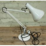 A Herbert Terry & Sons white anglepoise lamp.