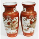 A pair of Japanese Kutani porcelain vases, six character marks to base, height 34cm. Condition -