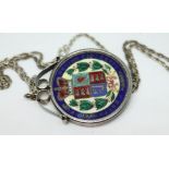 A Victoria enamelled crown on chain.