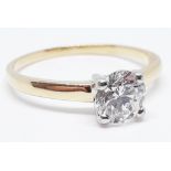 A diamond solitaire ring, the round brilliant cut 1.74 carat diamond in four claw setting,