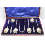 A cased set of hallmarked silver teaspoons and sugar tongs.