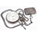 A hallmarked silver pocket watch with Albert chain having T bar, two keys and vesta case, watch