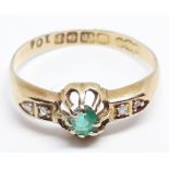 A hallmarked 18ct gold diamond emerald ring, gross wt. 1.9g, size N.