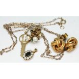 A mixed lot of 9ct gold jewellery comprising two pairs of earrings, a pendant set with various