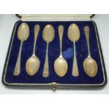 A cased set of six hallmarked silver spoons.