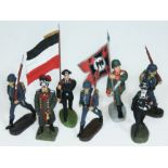 A group of German composition figures comprising six Elastolin including marching Hitler, three