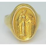 A Georgian style gold insignia type signet ring, indistinctly marked '750', gross wt. 9.5g, size R/