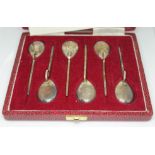 A cased set of six hallmarked silver spoons 'The Roman Spoon' by Mappin & Webb.