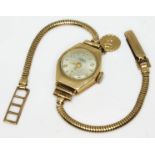 A hallmarked 9ct gold wristwatch with 9ct gold strap, gross wt. 14.2g.