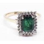 An 18ct gold diamond emerald cluster ring, band marked '18ct', gross wt. 5.9g, size Z.
