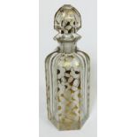 A French Art Deco gilt glass decanter, height 26.5cm. Condition - general wear to include nibbles to