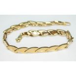 A 9ct gold bracelet, marked '375' and also with import marks, length 19cm, wt. 5.4g.