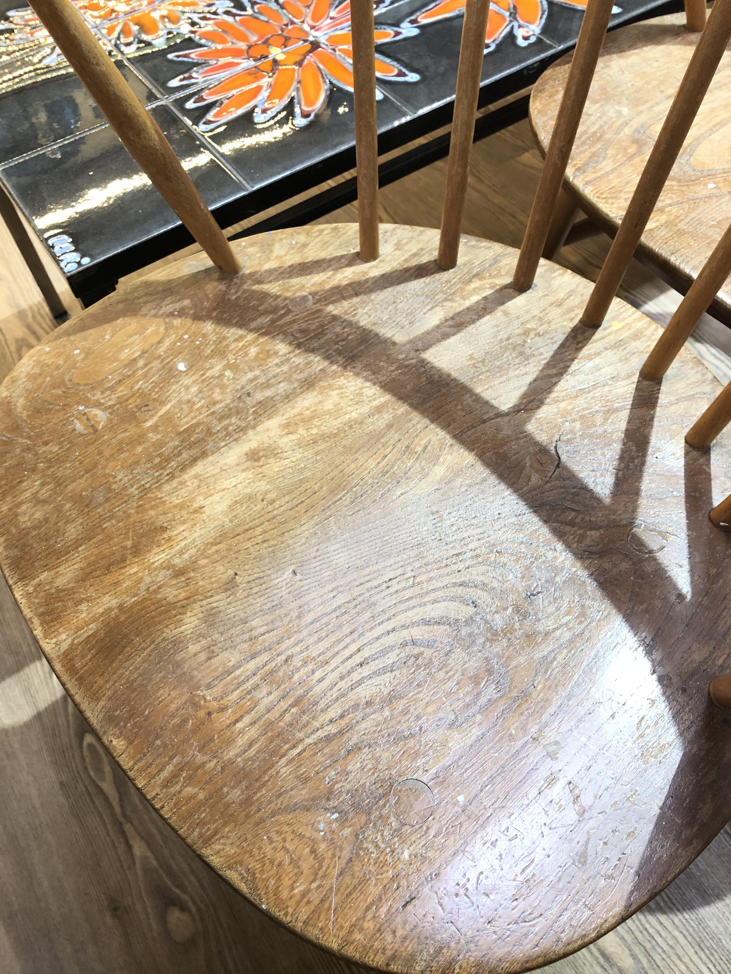 A set of four Ercol elm seated spindle back cow horn armchairs. - Image 3 of 16