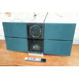 A Bang & Olufsen Beosound Century CD, tape cassette and radio player with Beolink 1000 remote.