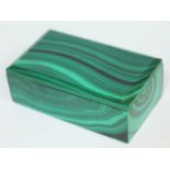 A malachite box, length 10.5cm.