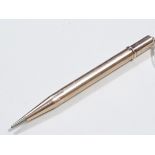 A hallmarked 9ct gold propelling pencil, length 11cm, gross wt. 21.2g.