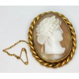 A 19th century yellow metal mounted cameo brooch, length 43mm, gross wt. 14.2g.