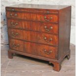 A George III mahogany bachelor's chest circa 1780, having crossbanded top, brushing slide above four