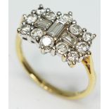 A diamond cluster ring featuring three central baguette cut diamonds surrounded by 12 round