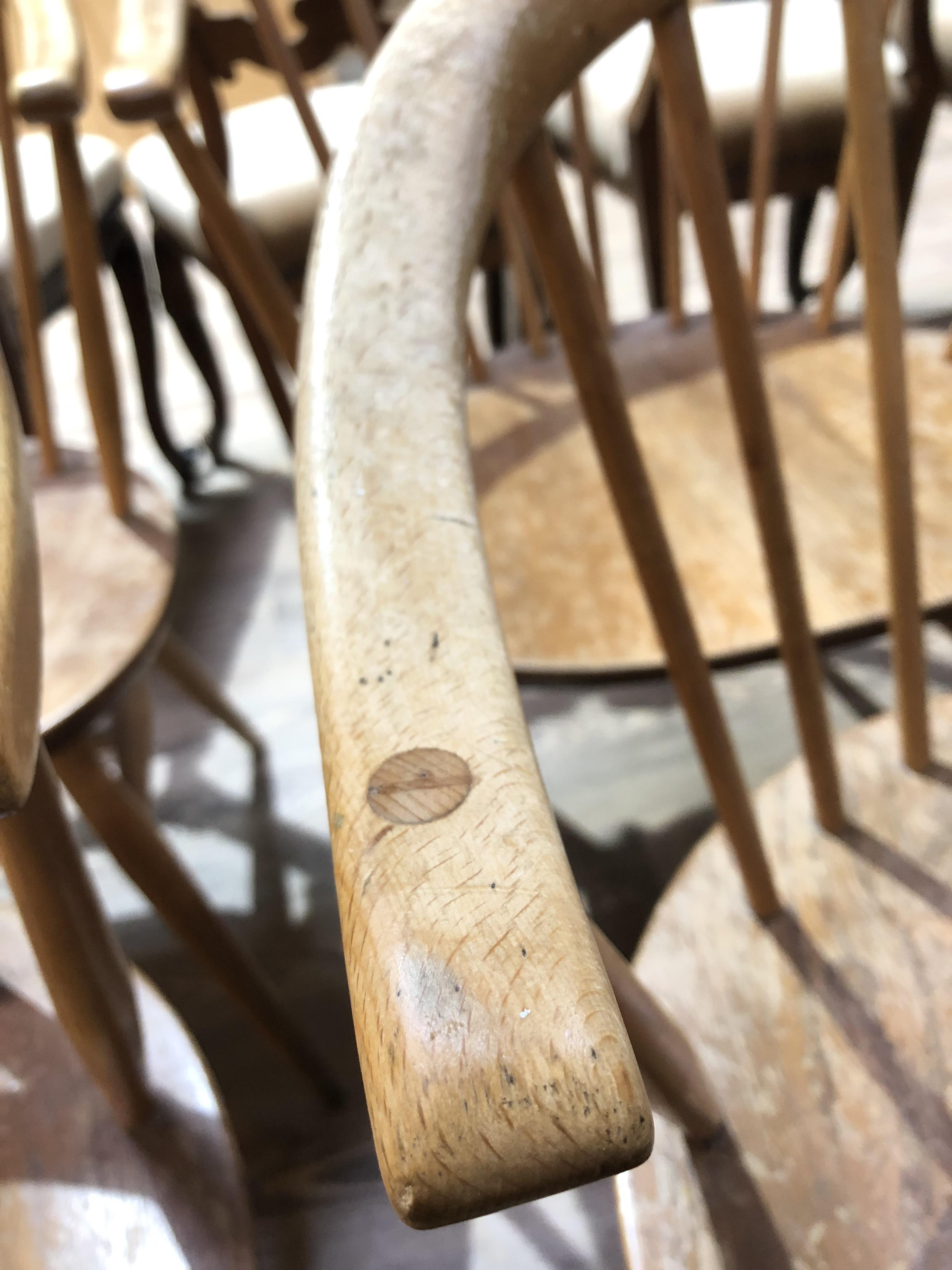 A set of four Ercol elm seated spindle back cow horn armchairs. - Image 4 of 16