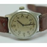 A Moeris stainless steel ATP military wristwatch, diam. 33mm, with brown leather strap.