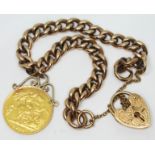 A hallmarked 9ct gold link chain bracelet with a George V 1918 half sovereign charm, gross wt. 22.