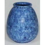 A Ruskin Arts & Crafts mottled blue and ribbed vase, impressed 'Ruskin England 1930' to base, height