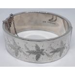 A hallmarked silver bangle, diam. approx. 67mm, wt. 32.7g.