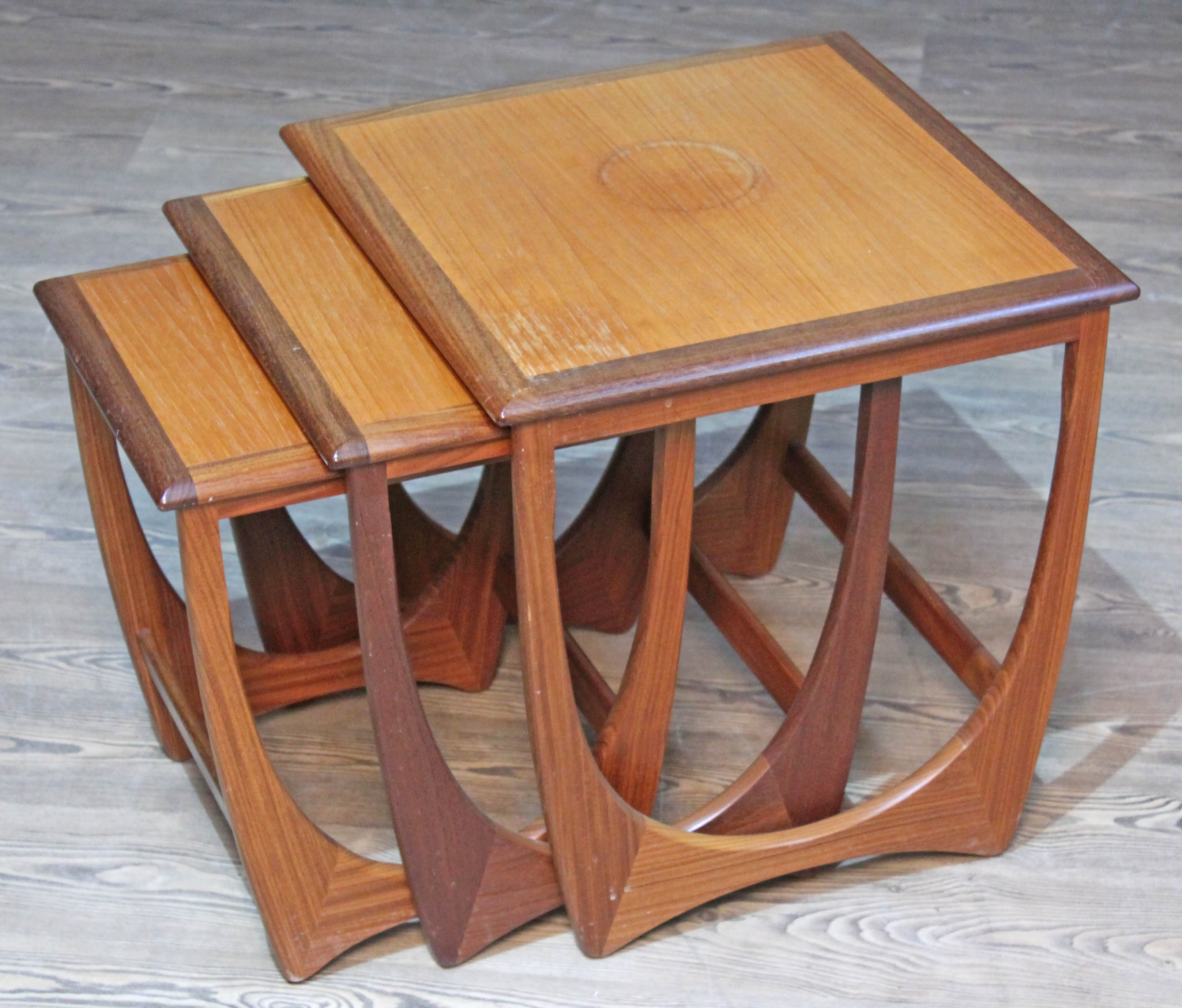 A G-Plan teak nest of tables.