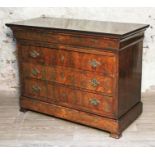 A French Louis Phillipe walnut commode circa 1840 with later mahogany top and gilt brass handles,