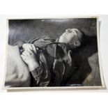A collection of WWII press photographs approx. 53 photographs including The Body of Heinrich