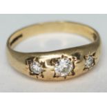 A hallmarked 9ct gold ring set with colourless stones, gross wt. 2g, size P.