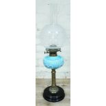 A Victorian blue glass and brass parafin lamp, height 72cm.