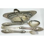 A mixed lot of hallmarked silver comprising a Christening set, a pierced dish and a pair of sugar