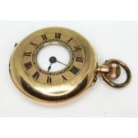 A 9ct gold gold ladies half hunter pocket watch.