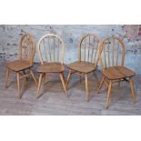 A set of four Ercol blonde elm and beech chairs.