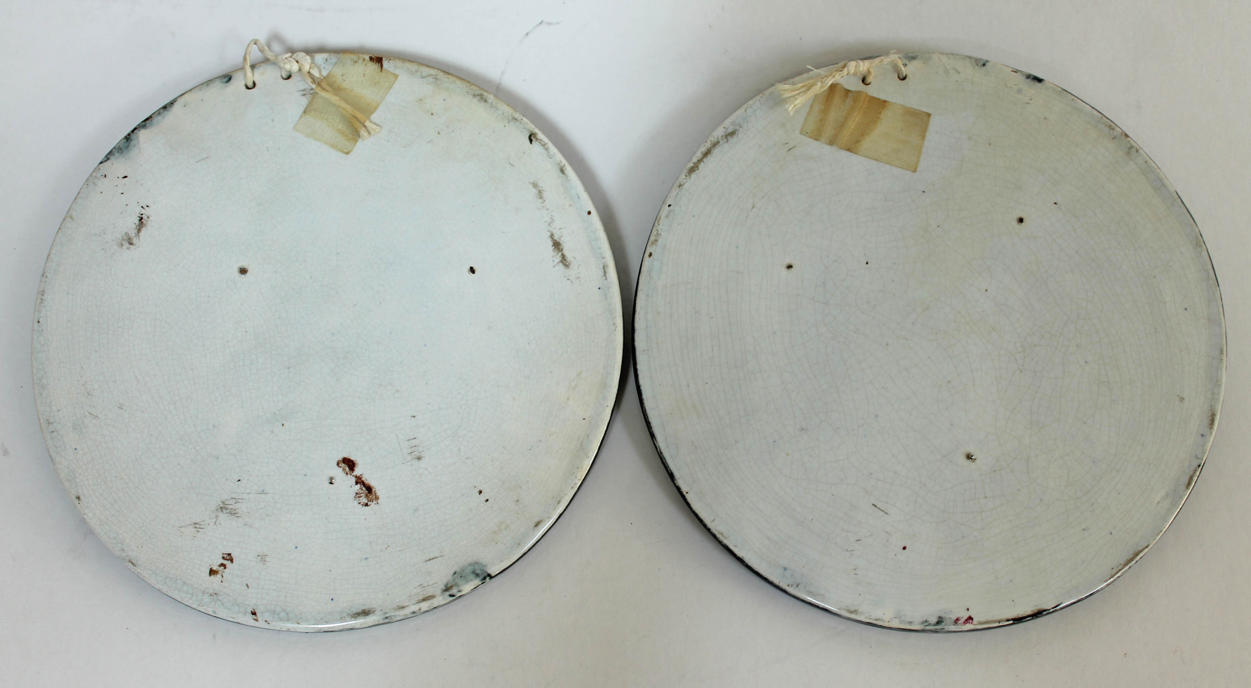 A pair of Portobello earthenware plaques, 19th century, diam. 23.5cm each. Condition - good, each - Image 2 of 2