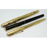 Three Parker pens.