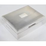 A hallmarked silver and cedar lined box, length 11.4cm.