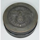 A German Nazi snuff box of circular form with mounted eagle and swastika motif, diam. 6.8cm,