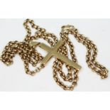 A 9ct gold crucifix pendant on chain, both marked '375' and also with import marks, chain length