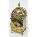 A 19th century brass lantern clock, height 38cm.