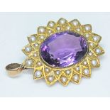 A Victorian amethyst and pearl pendant, the central stone approx. 15mm x 12mm, depth 7mm, pendant