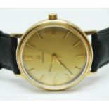 A gold plated Omega wristwatch, case diam. 33mm, later leather strap. Condition - appears in working