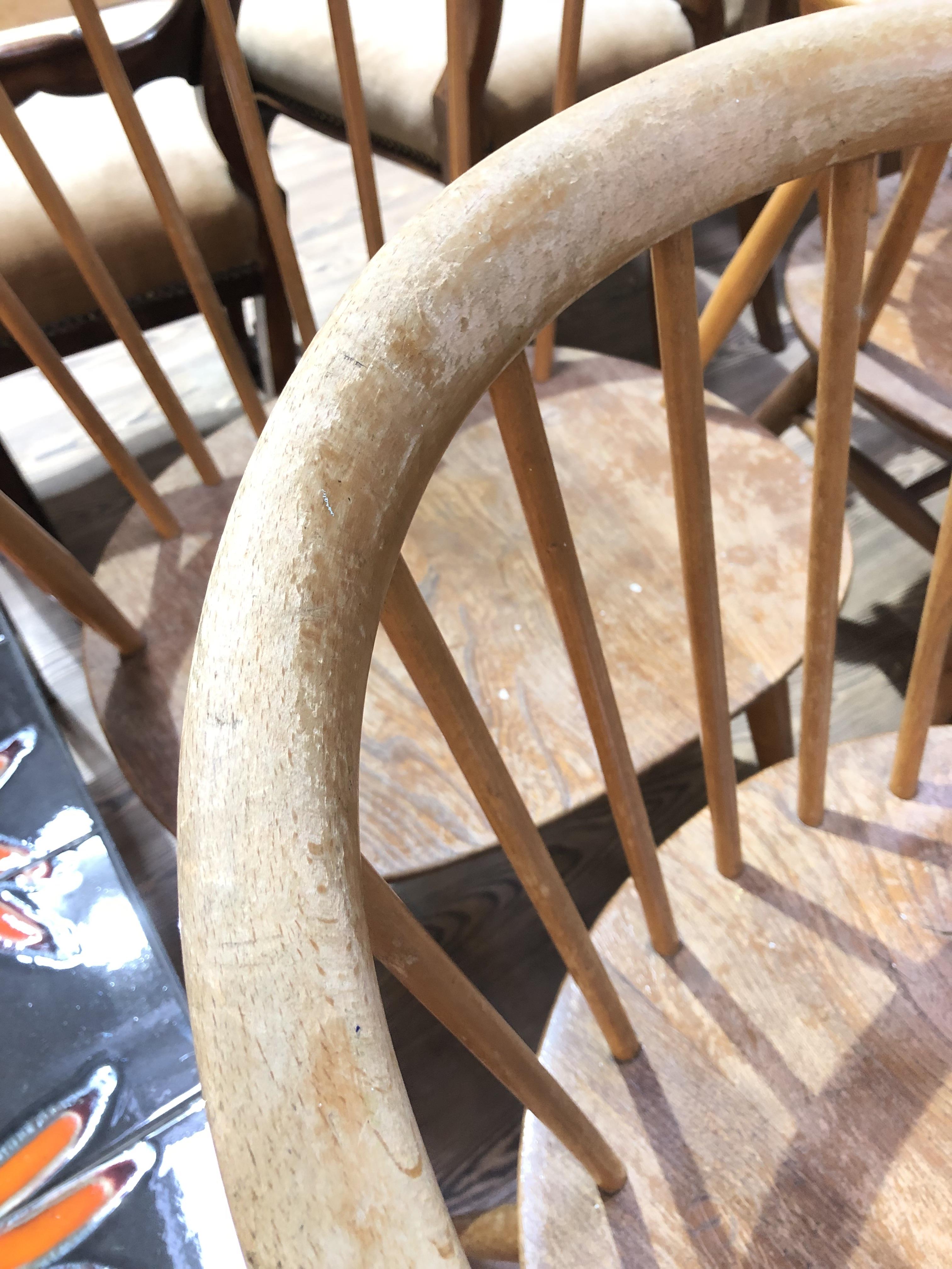 A set of four Ercol elm seated spindle back cow horn armchairs. - Image 2 of 16