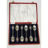 A set of six hallmarked silver and enamel spoons commemorating the Coronation of Queen Elizabeth II,