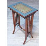 A Regency and later mahogany side table with pierced brass inlaid top, turned supports and splayed