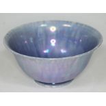 A Ruskin light blue lustre pedestal bowl with flared rim, impressed '1925 Ruskin England' to base,