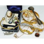 A mixed lot of vintage jewellery including two gold plated bangle watches, a gold plated bangle, a